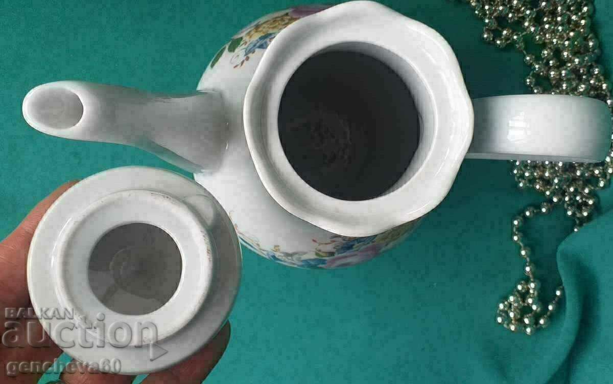 Porcelain jug teapot baroque with GDR floral motifs with price 40.00 BGN | € 20.45 Porcelain jug teapot baroque with GDR floral motifs with price 40.00 BGN | € 20.45