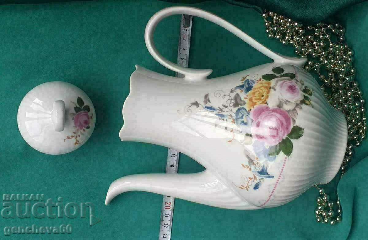 Auction Porcelain jug teapot baroque with GDR floral motifs Auction Porcelain jug teapot baroque with GDR floral motifs