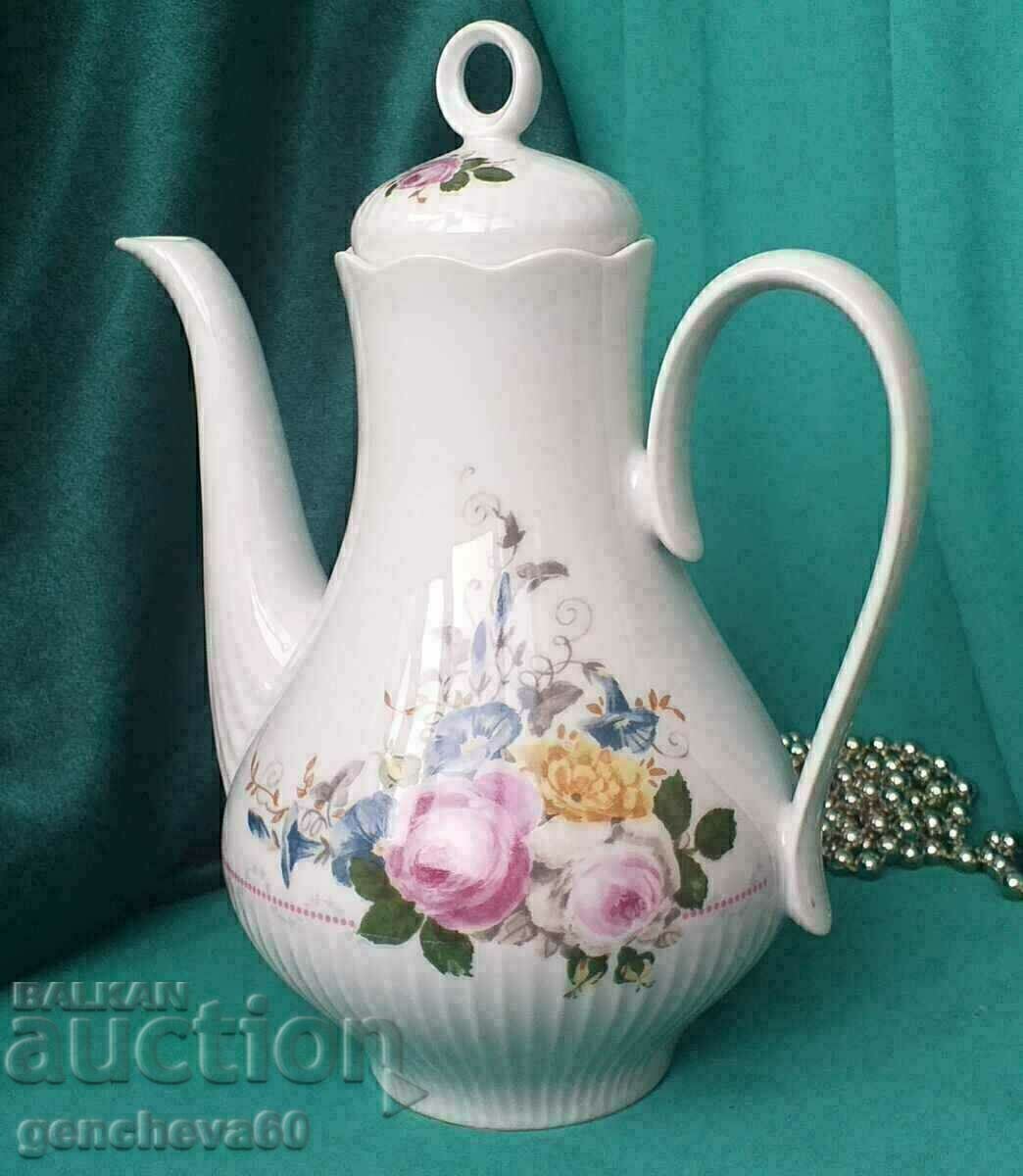 Delivery of Porcelain jug teapot baroque with GDR floral motifs Delivery of Porcelain jug teapot baroque with GDR floral motifs