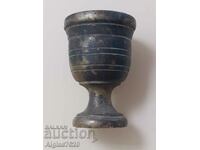 A very old bronze cup