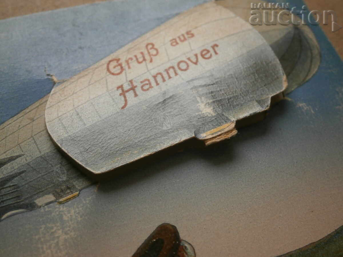 Delivery of Hannover vintage postcard with an airship from the 1930s Delivery of Hannover vintage postcard with an airship from the 1930s