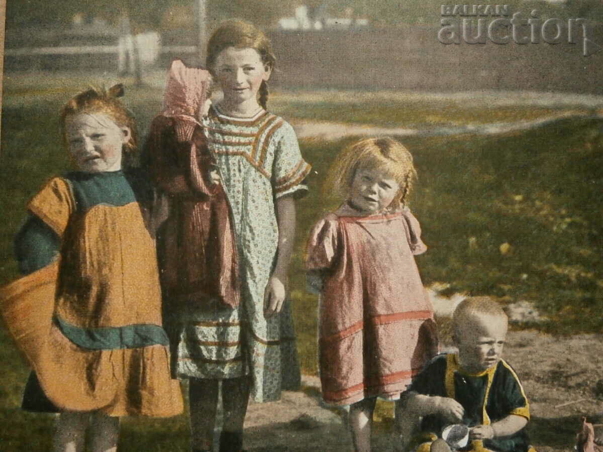 Auction vintage postcard of children on the beach in the 1930s Auction vintage postcard of children on the beach in the 1930s