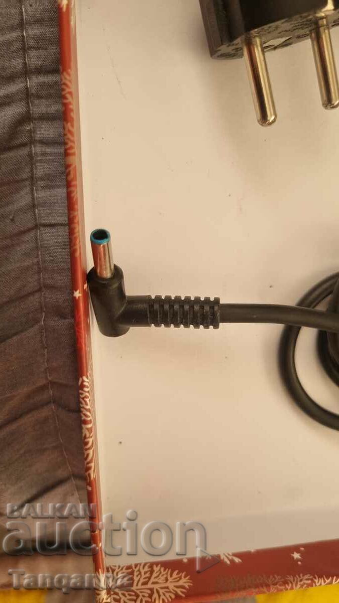 Licitație încărcător pentru laptop