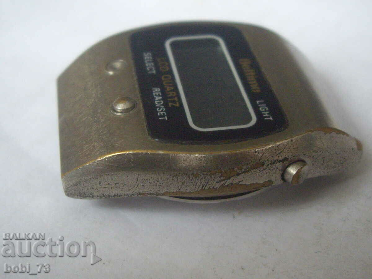 Auction  Digital watch.