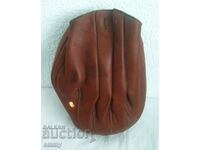Old leather boxing glove for training, left hand