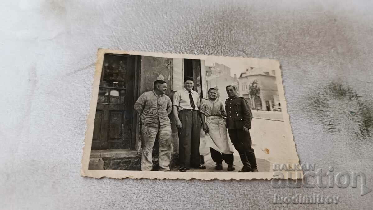 Photo Sofia An officer and three men on the street