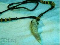 a beautiful blackbird horn necklace is natural kamani onox