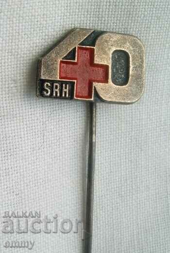 Insigna - 40 de ani Crucea Roșie, Croația cu preț 5.00 BGN | € 2.56 Insigna - 40 de ani Crucea Roșie, Croația cu preț 5.00 BGN | € 2.56