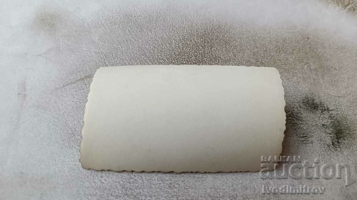 Photo Sofia A man at the door of his shop with price 2.45 BGN | € 1.25 Photo Sofia A man at the door of his shop with price 2.45 BGN | € 1.25