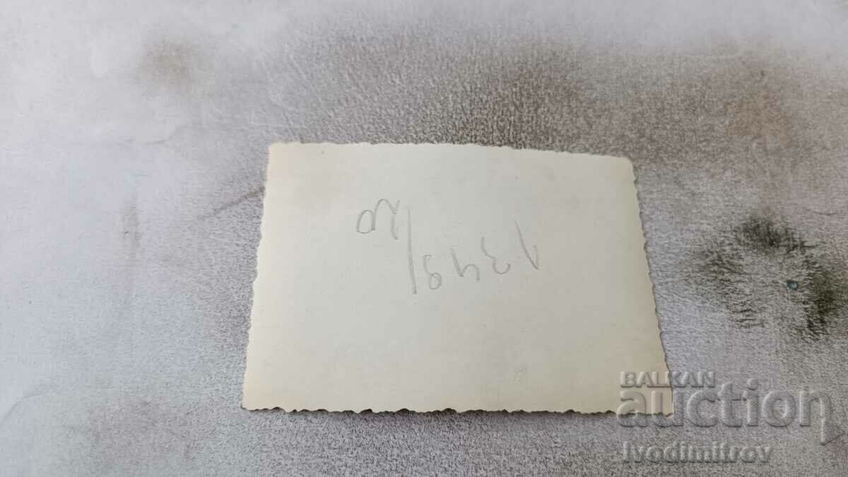 Photo Man on a large stone in the sea with price 2.35 BGN | € 1.20