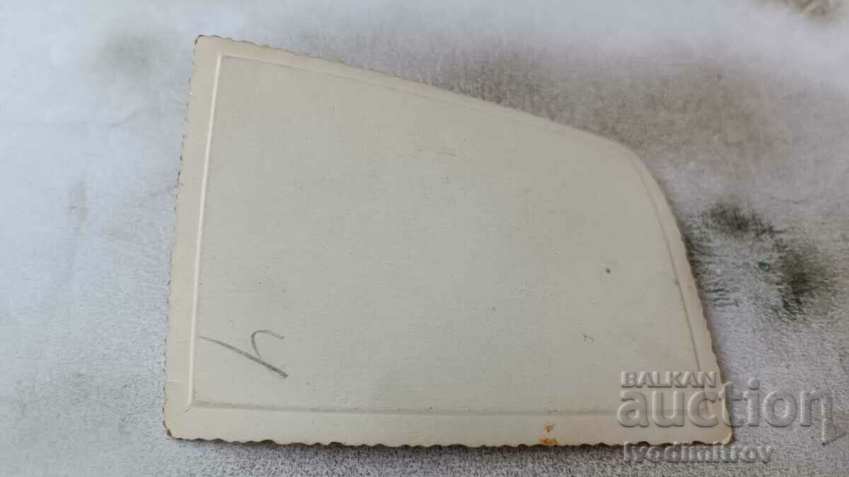 Photo Man woman and children in a swimming pool with price 2.45 BGN | € 1.25