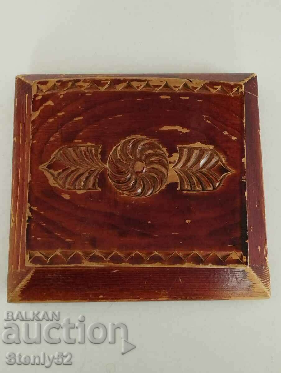Old wooden jewelry box with carving.