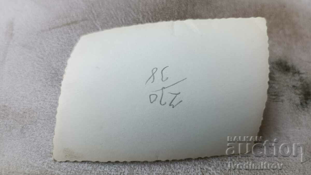 Photo A man in shorts lying on the grass with price 2.65 BGN | € 1.35 Photo A man in shorts lying on the grass with price 2.65 BGN | € 1.35