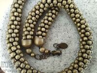 Colier masiv de designer, lucrat manual, cu efect de top