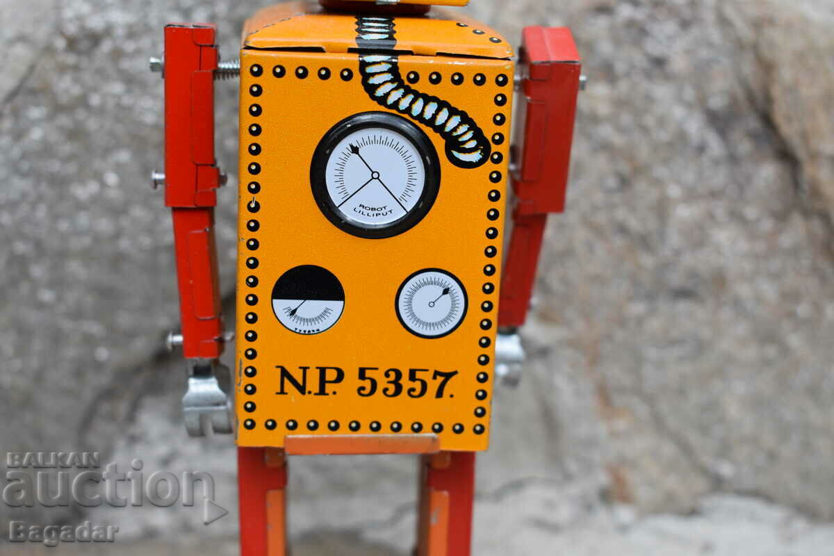 Tinplate toy robot with price 50.00 BGN | € 25.56 Tinplate toy robot with price 50.00 BGN | € 25.56