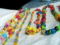 πολλά παιδικά πλαστικά ναυτικά κοσμήματα άνω των 24 τμχ