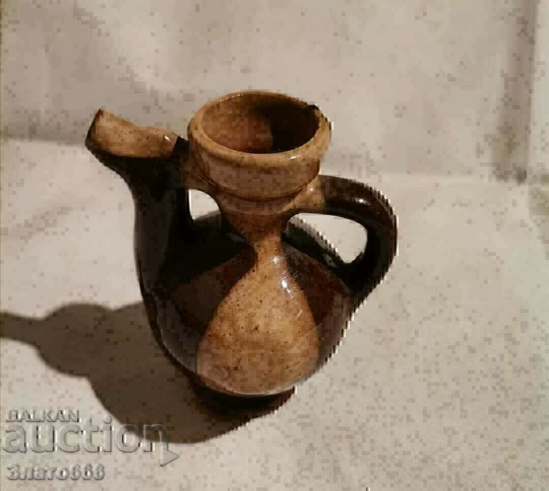 Auction Old, small, decorative pitcher Auction Old, small, decorative pitcher