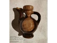 Old, small, decorative pitcher
