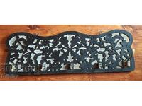 Antique openwork wooden hanger.