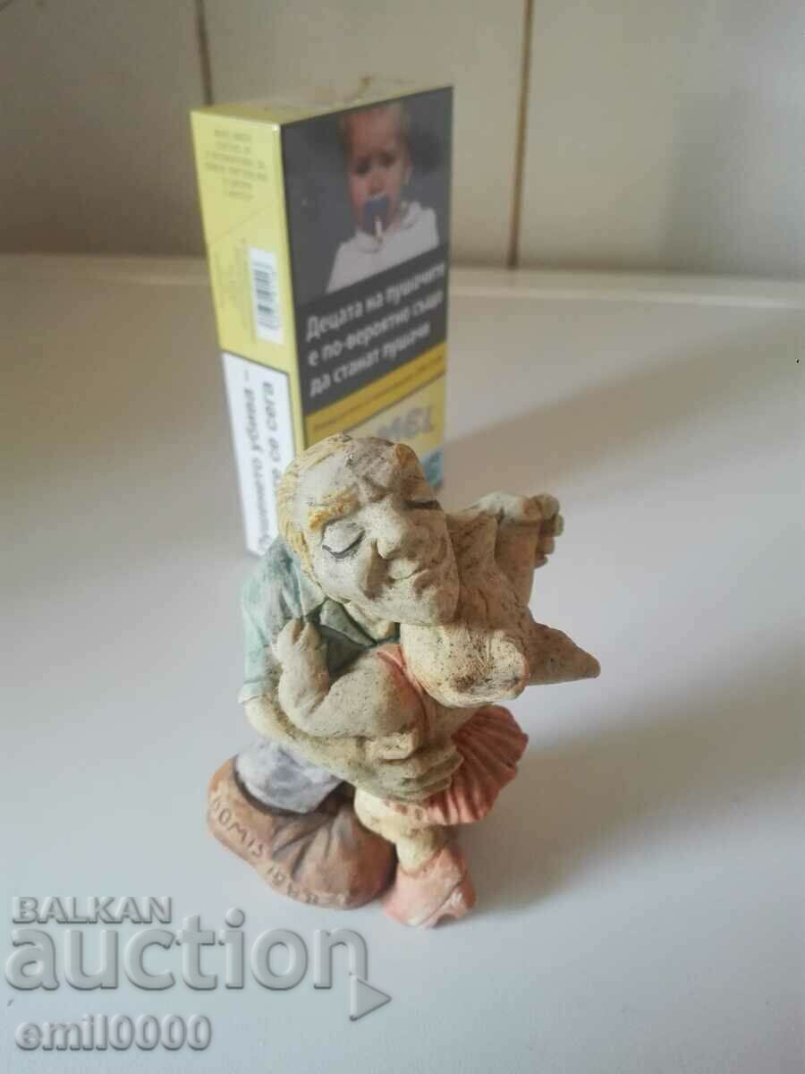 Plaster figurine.