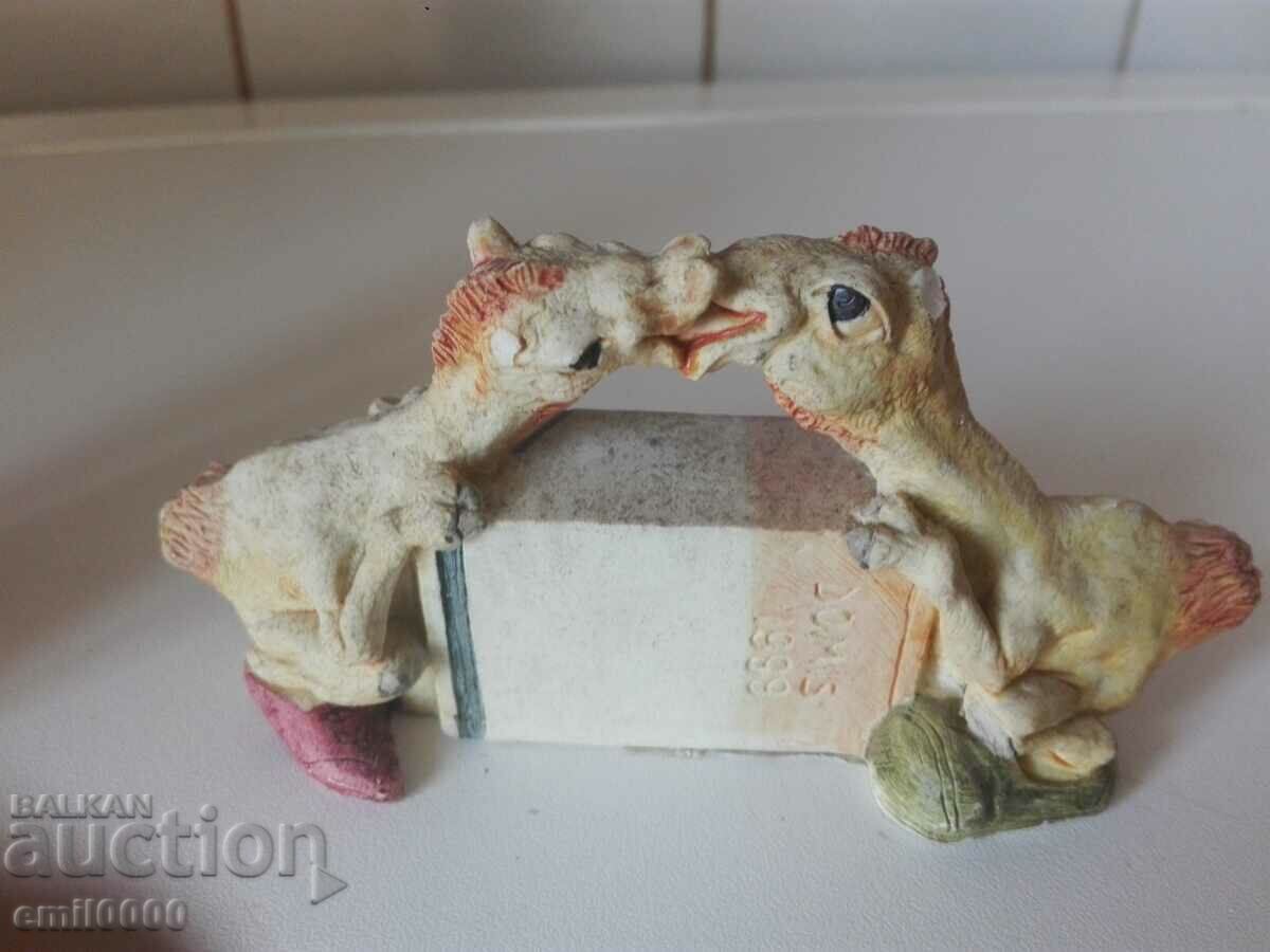 Delivery of Two plaster camel figurines. Delivery of Two plaster camel figurines.