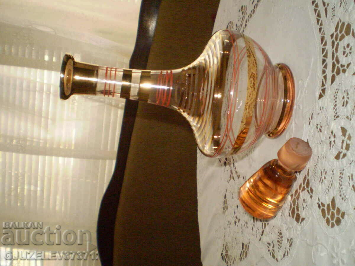 Retro colored glass carafe with gold ornaments and stopper with price 90.00 BGN | € 46.02 Retro colored glass carafe with gold ornaments and stopper with price 90.00 BGN | € 46.02