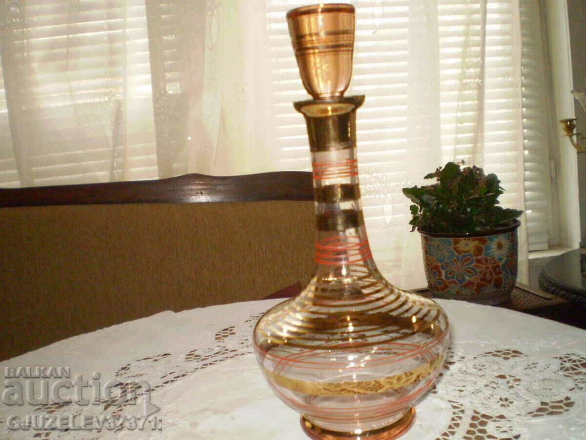 Retro colored glass carafe with gold ornaments and stopper