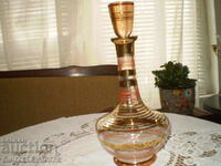 Retro colored glass carafe with gold ornaments and stopper