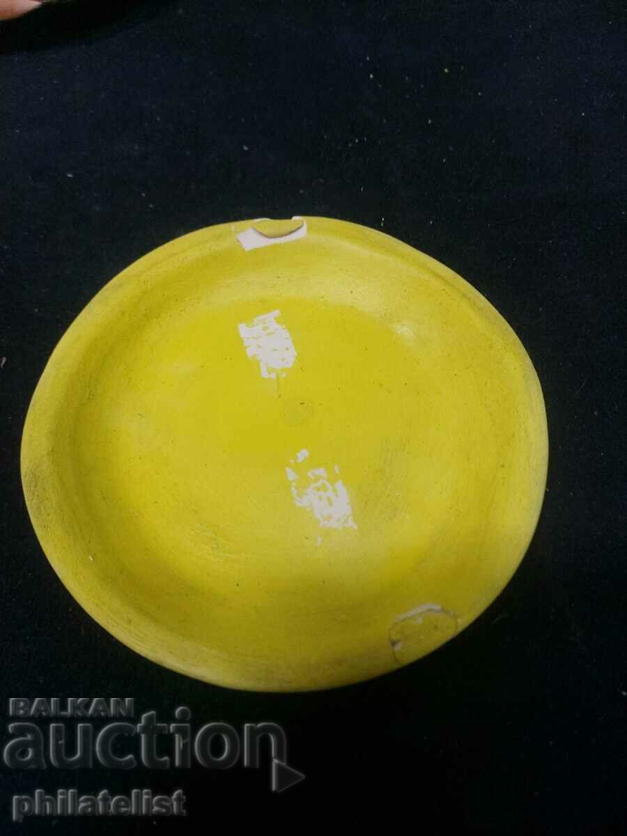 Yellow ashtray