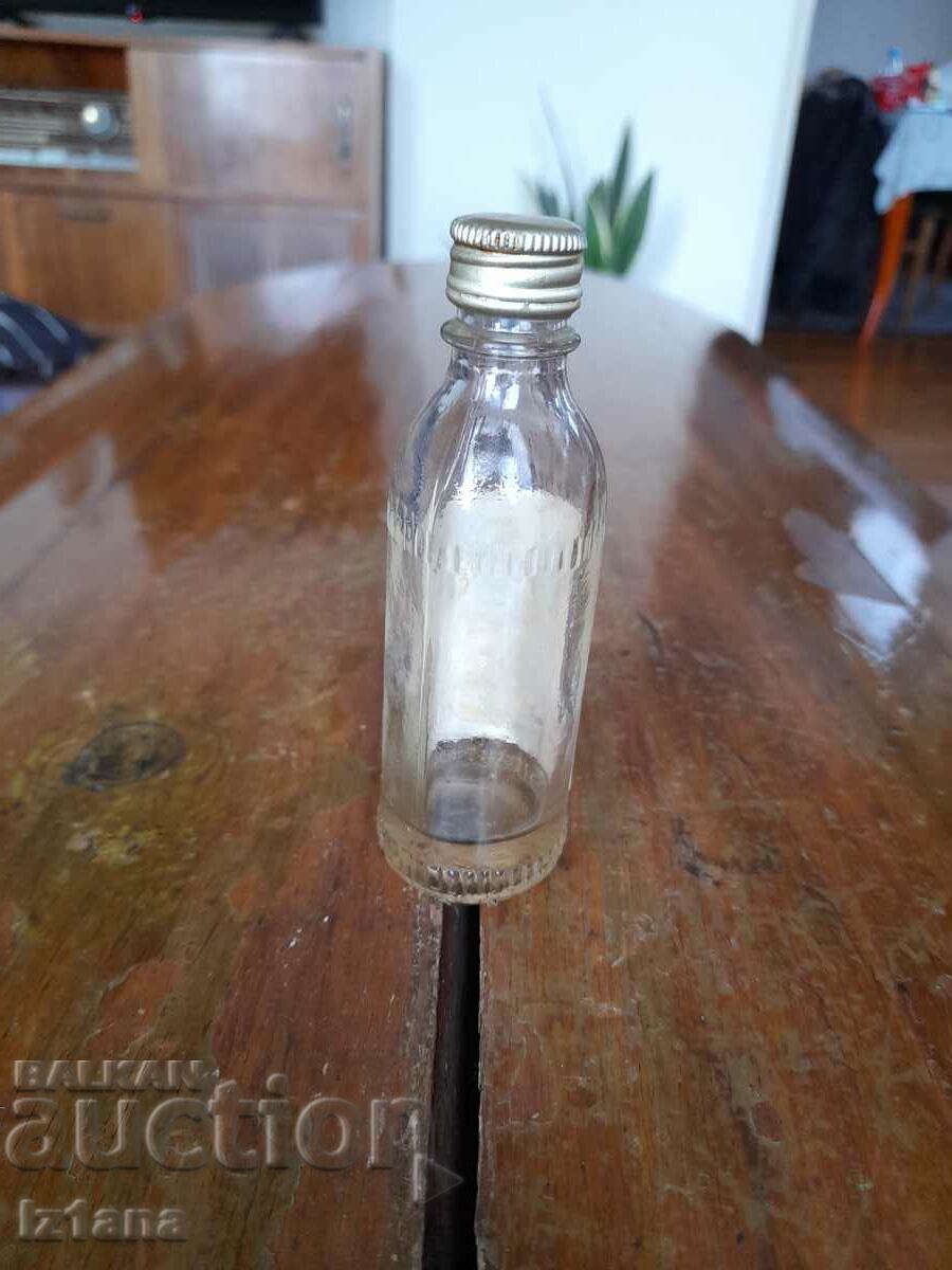 Auction An old bottle of William brandy Auction An old bottle of William brandy