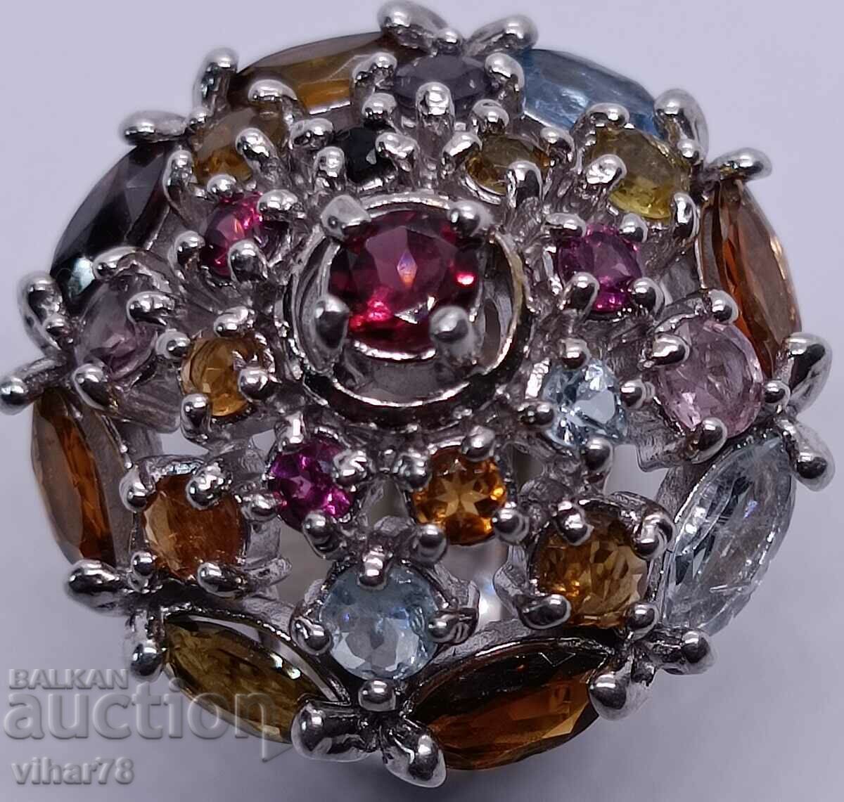 Massive Silver ring with a huge bouquet of stones