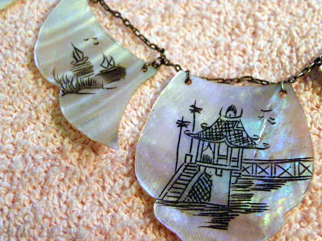 Elegant Japanese silver necklace with engraved mother of pearl with price 59.00 BGN | € 30.17 Elegant Japanese silver necklace with engraved mother of pearl with price 59.00 BGN | € 30.17