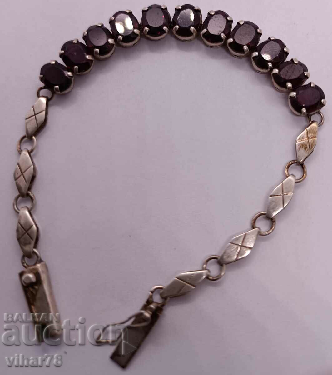 Auction silver bracelet with garnet Auction silver bracelet with garnet