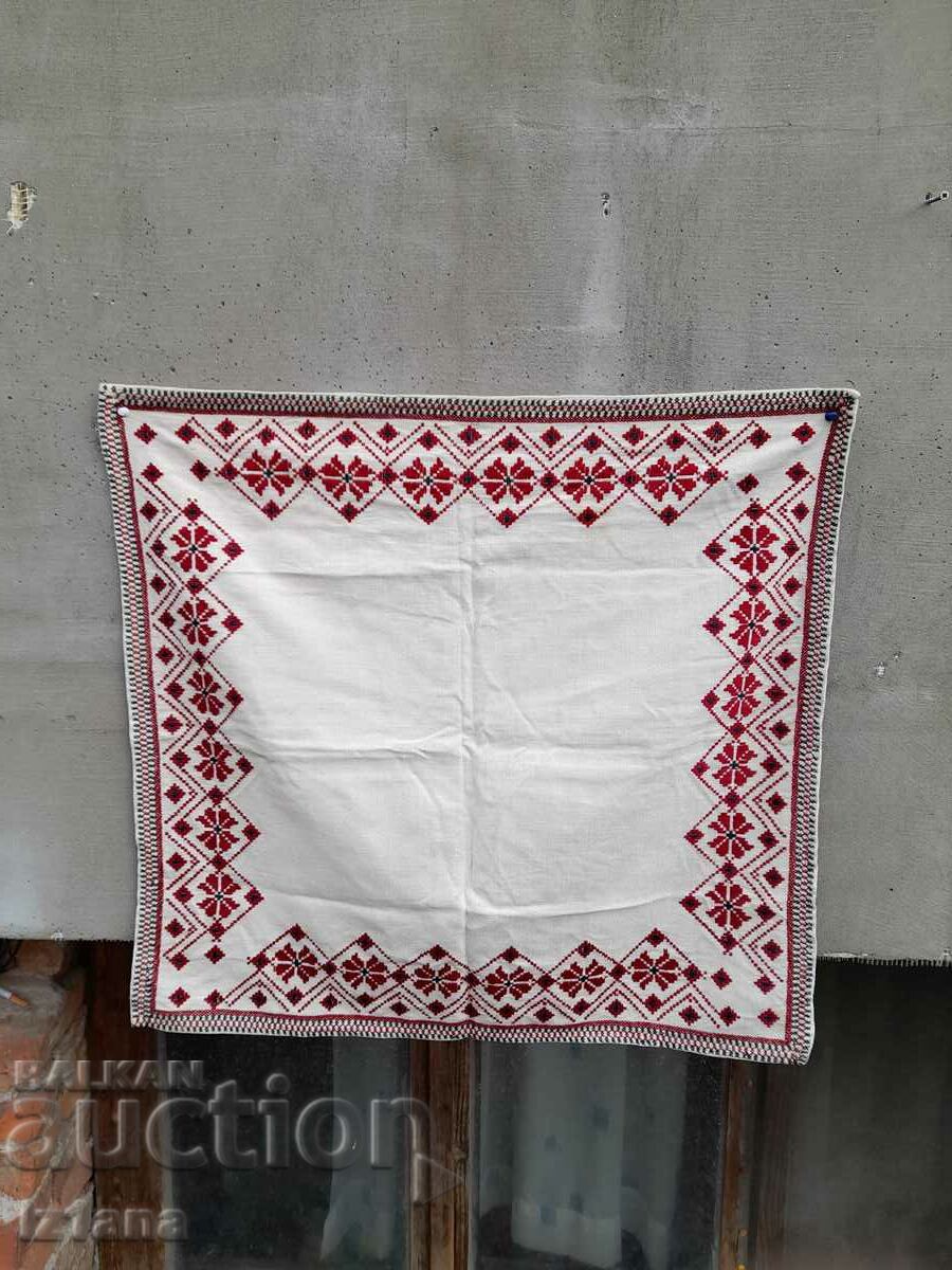 Old embroidered tablecloth, square