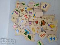 Children educational game, puzzle type with letters