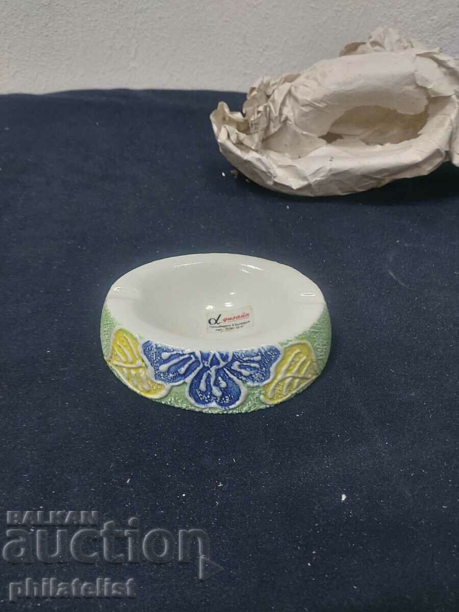 Ashtray with decorations.