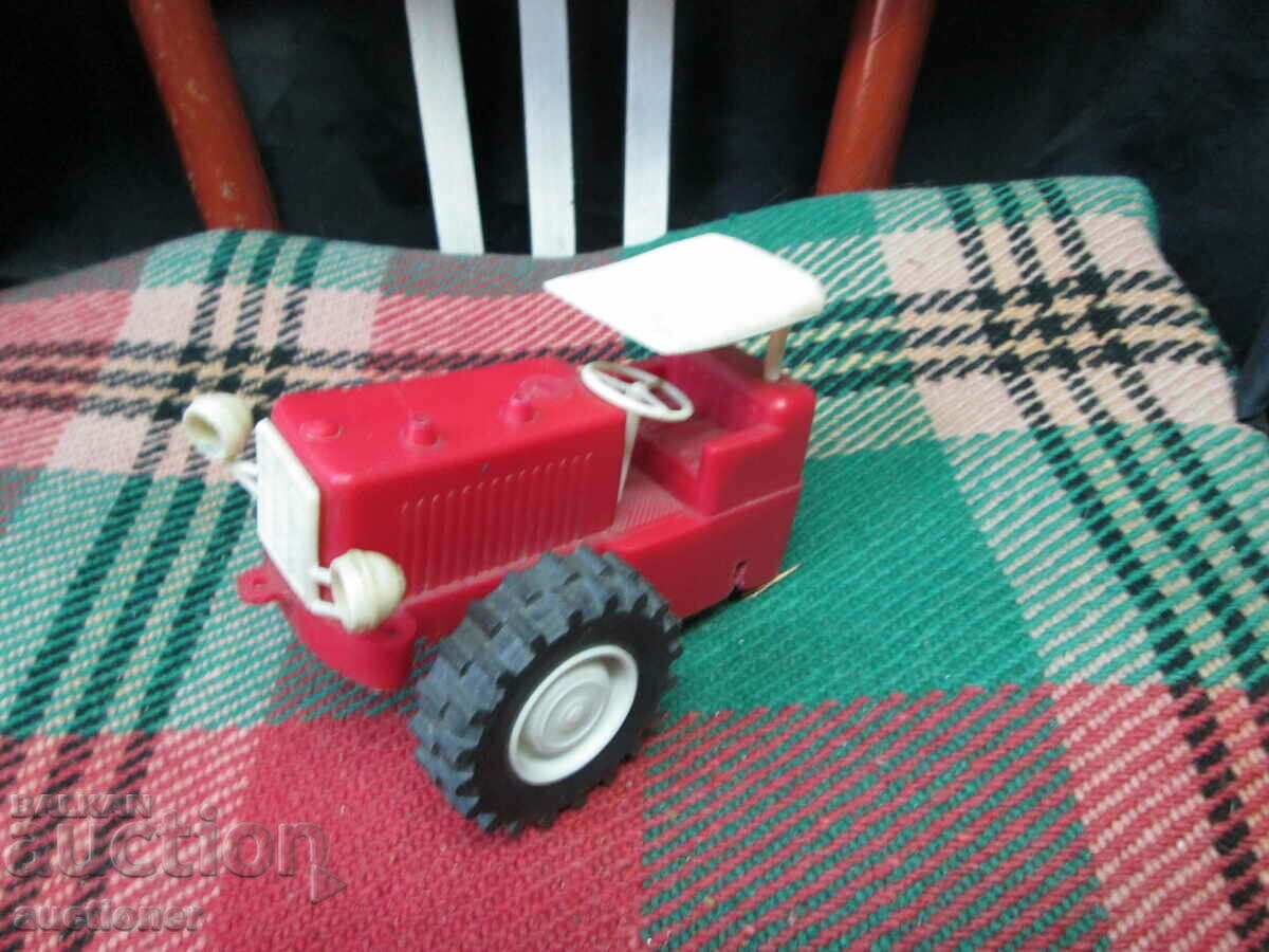 Auction LARGE PLASTIC TRACTOR-SOCIAL TOY Auction LARGE PLASTIC TRACTOR-SOCIAL TOY