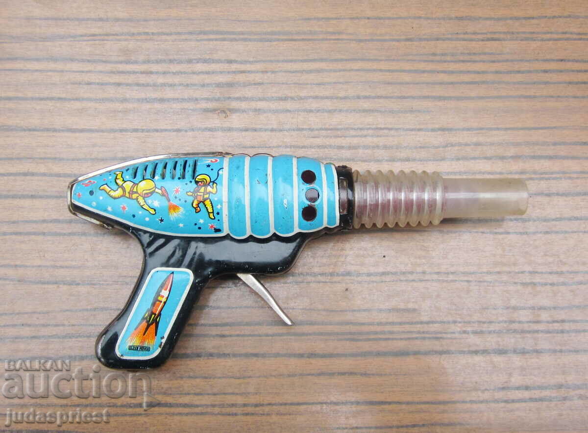 old tinplate mechanical spaceship toy from soca