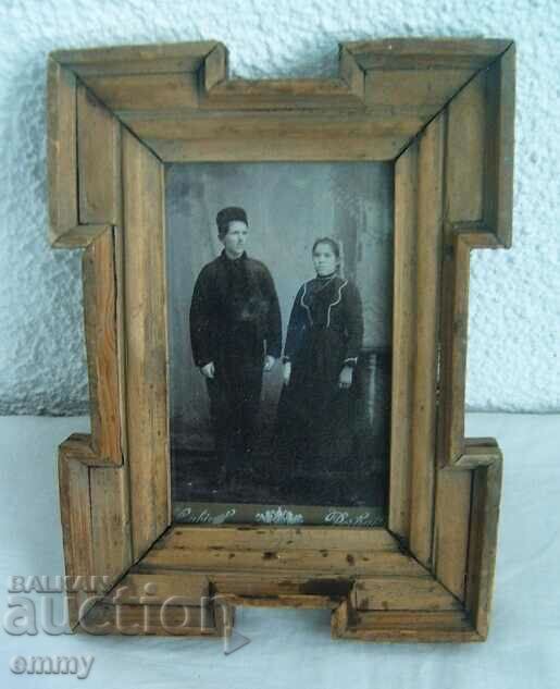 Family photo in a wooden frame, glass