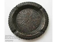Old beautiful wrought iron ashtray with floral decoration