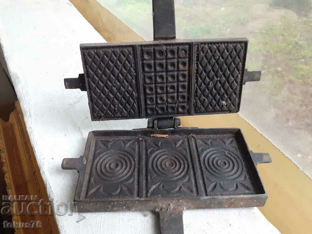 Delivery of Old antique waffle iron Delivery of Old antique waffle iron