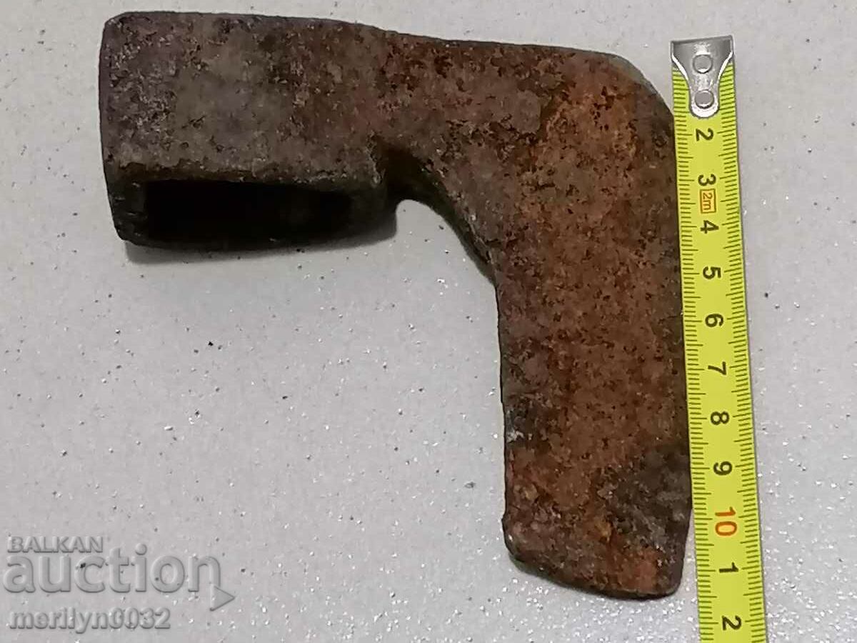 Delivery of An old ax, a torso, a toothbrush wrought iron Delivery of An old ax, a torso, a toothbrush wrought iron