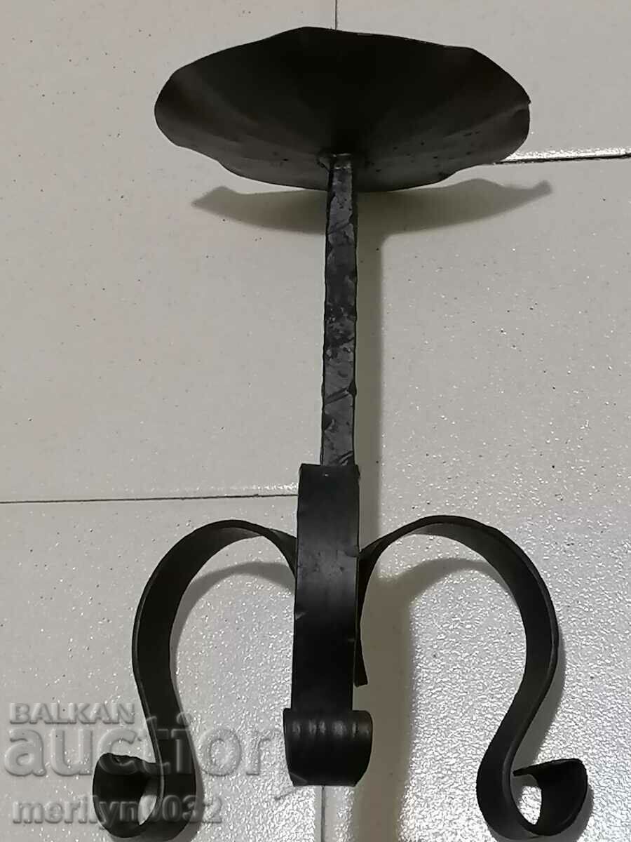 Delivery of Old forged candlestick, candle