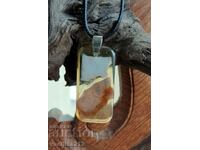 Κολιέ, πρωτότυπο