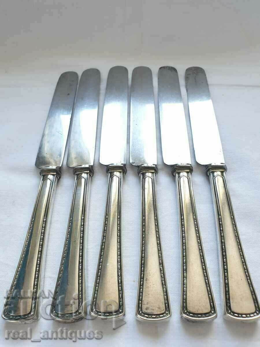 Set of silver knives