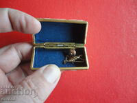 Gold plated brooch clip accessory in box