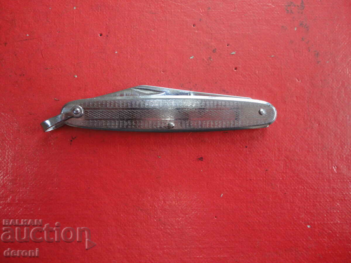 Delivery of German metal knife with opener Delivery of German metal knife with opener