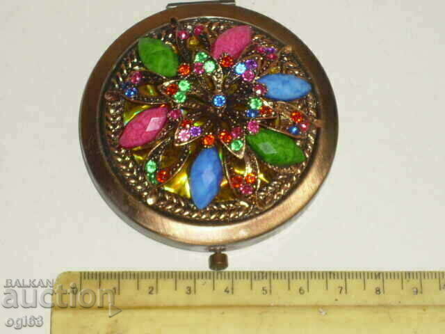 Mirror with openwork decoration with price 12.00 BGN | € 6.14