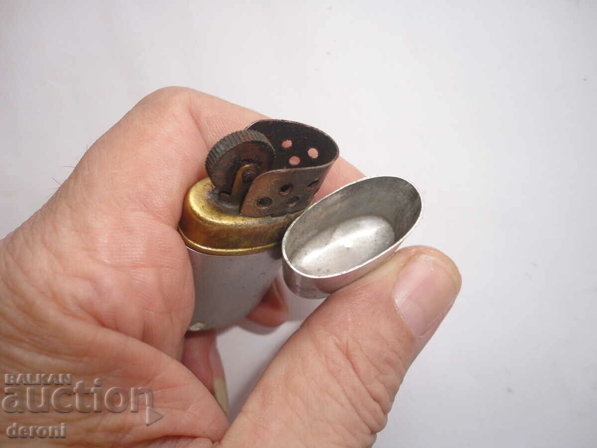 Auction  German aluminum army petrol lighter