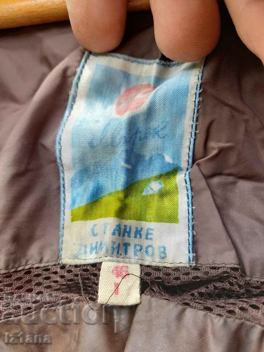 Livrarea Pelernă de ploaie veche, parcă de vânt